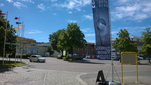 A banner advertising Momentum in downtown Moss.